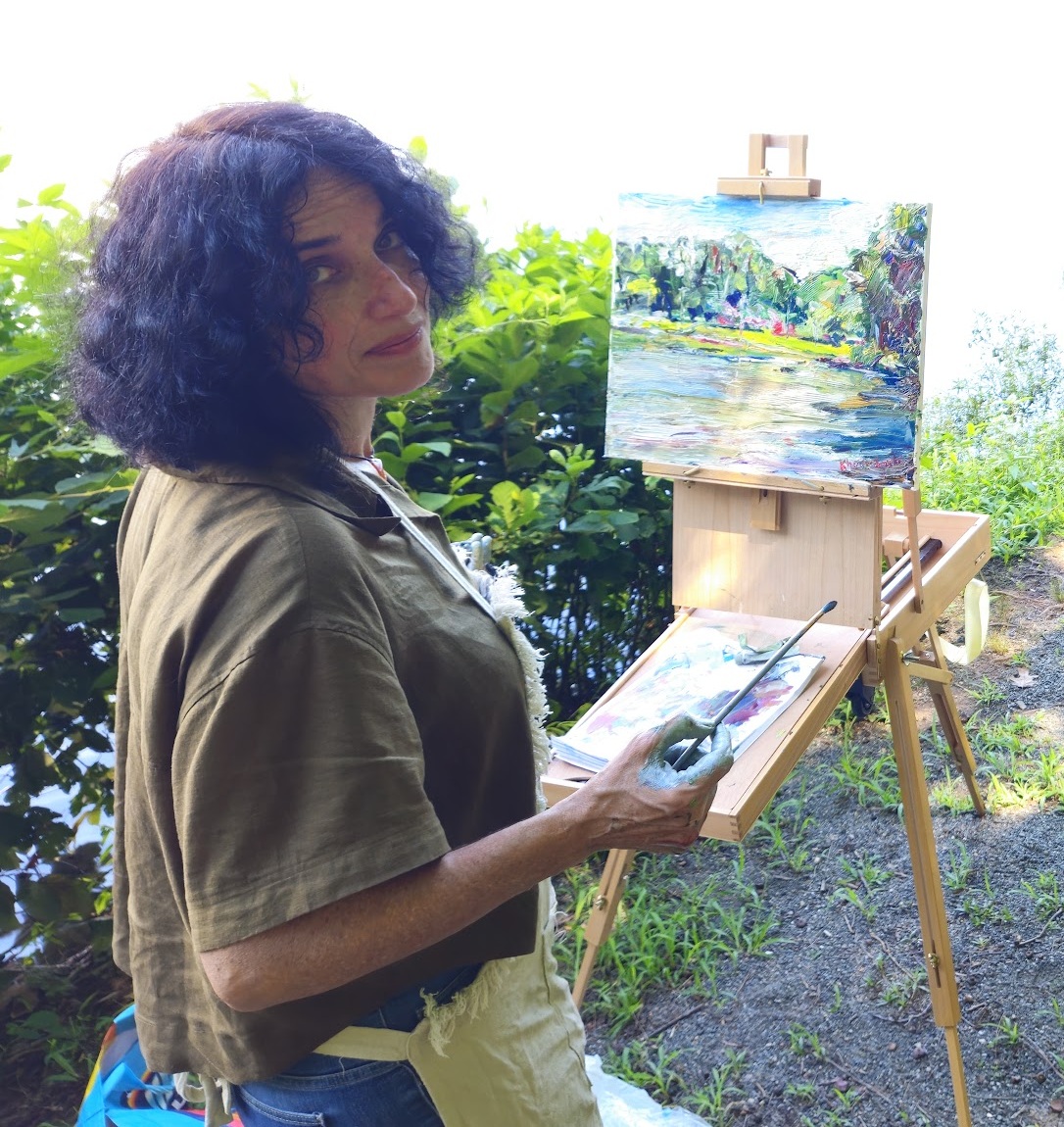 Anna Khodorkovski painting outdoors at an easel